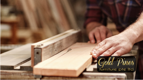 Goldpines | Carpenter hand cutting wood